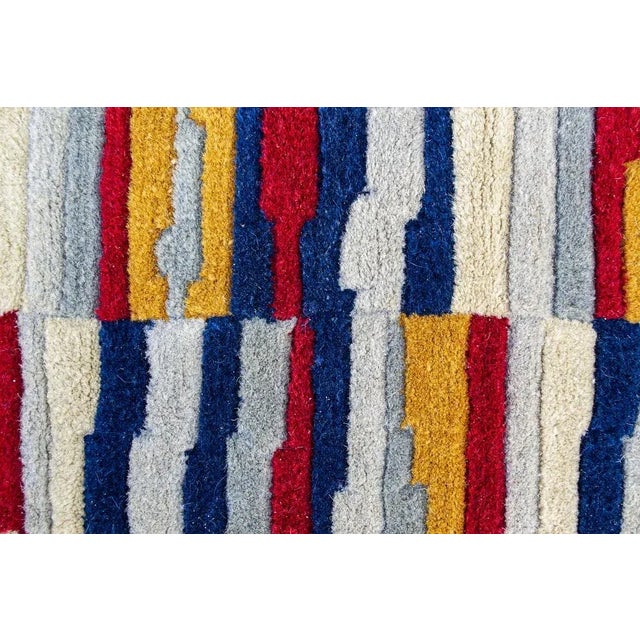 Rug with geometric designs. Handed by hand. Italian production 70's