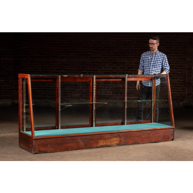 Large antique commercial display showcase manufactured by W.B. McLean Manufacturing Company of Pittsburgh, Pennsylvania....