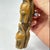 The Baule Figural Slingshot, a stunning piece of African art that showcases the skillful craftsmanship and cultural...