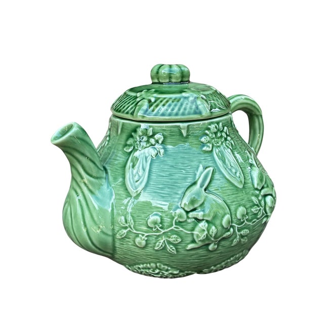 This lovely classic vintage green glazed Majolica rabbit teapot is made in Portugal by Bordallo Pinheiro. With a basket-...