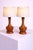 A charming pair of scandinavian modern table lamps by markslöjd, sweden, dating to the 1950s. Crafted in solid teak, the...