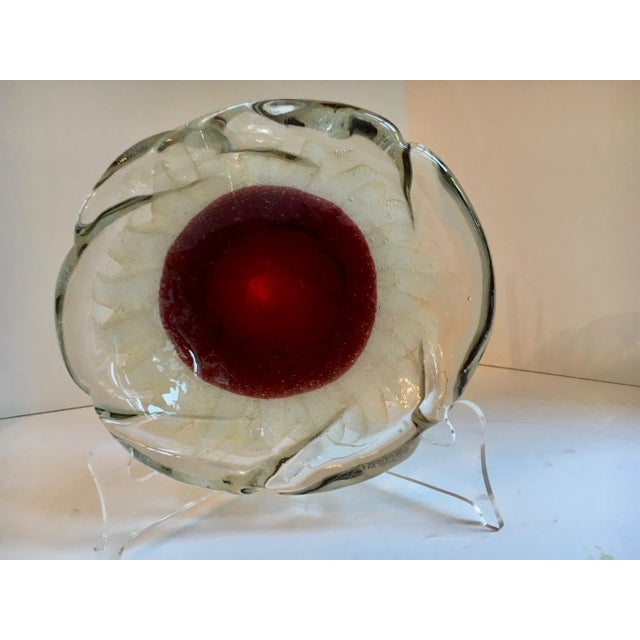 A spectacular Murano Bowl - rare and desirable, this piece has a large red centre with accents of 24-karat gold in the...