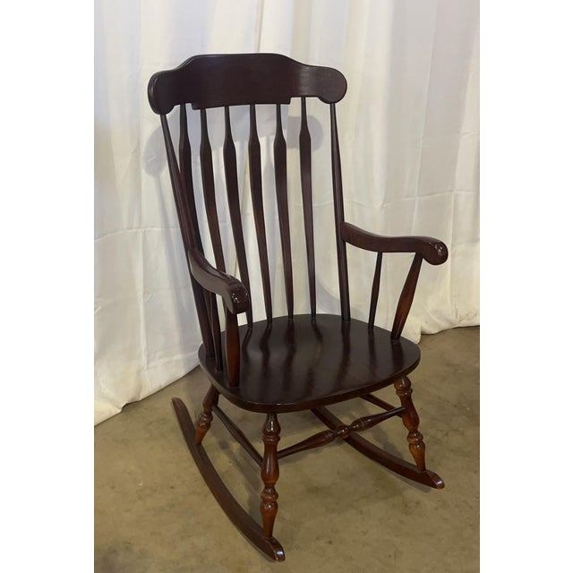 This exceptional vintage Windsor-style rocking chair combines classic Early American character with excellent lumbar...
