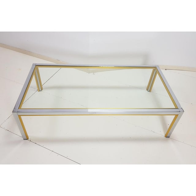 vintage coffee table renato zevi brass Italy hollywood regency 1970s This brass and chrome table by Renato Zevi, is a...