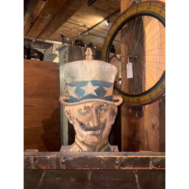 This is a rare and historically significant World War I-era carnival knockdown game, specifically titled "Knock the Helmet...