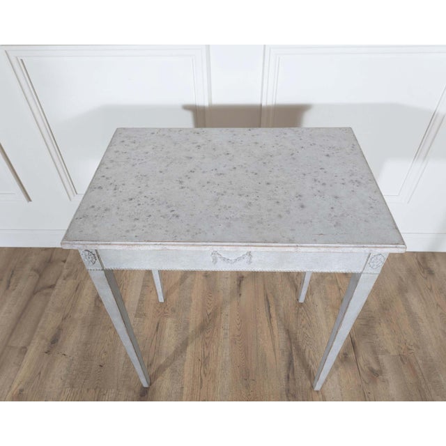 This refined Swedish console table, crafted circa 1880, captures the understated elegance and balanced proportions...