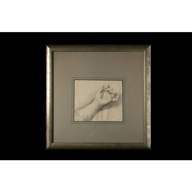 This 17th-century French School drawing of a hand is a masterful work of art, presented in an elegant silver gilt frame....
