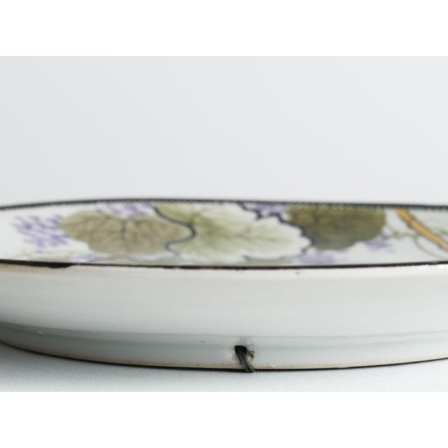 Meiji Hand-Painted Kutani Porcelain Charger with Women and Vine Arbor, 1920s For Sale - Image 3 of 18