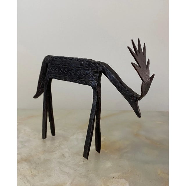 Rustic small primitive metal elk for you shelf or table top. Elk: 5.75"W x 1.5"D x 5"H