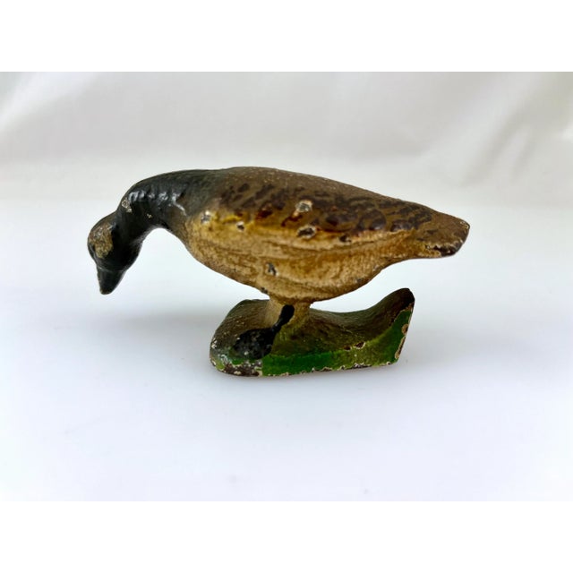This is a hand painted cast iron goose bottle opener. It is in overall very good condition. The finish is original, but is...