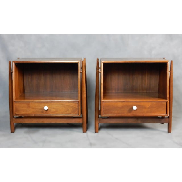 A pair of Mid-Century Modern nightstands designed by Kipp Stewart & Stewart MacDougall for Drexel’s ‘Declaration’ line,...