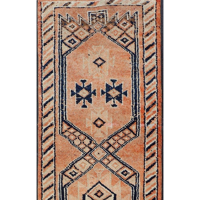 Tribal Medallion Design Vintage Turkish Runner in Orange and Navy Blue For Sale - Image 4 of 12