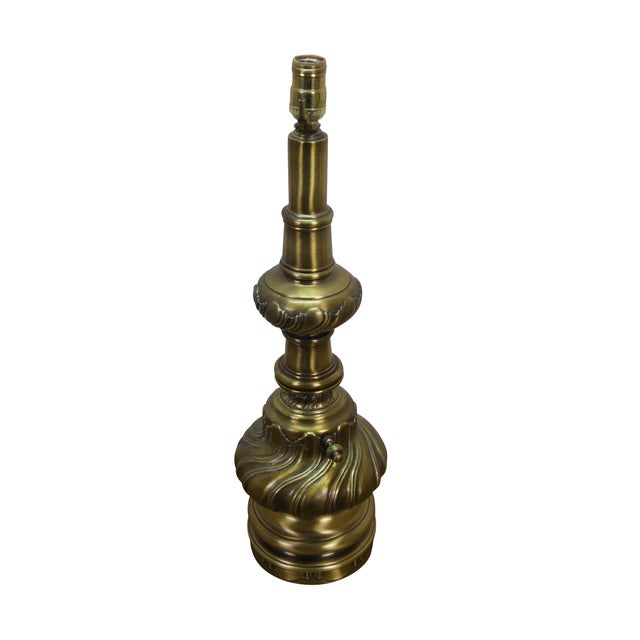Vintage brass Hollywood Regency style table lamp featuring a baluster oil lantern design. Dimensions: 7" x 23.5" (D x H)