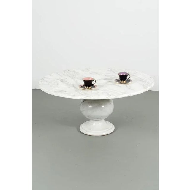 Italian marble coffee table with a classic shape base. The lacquer has been removed from the top since it was discoloured....