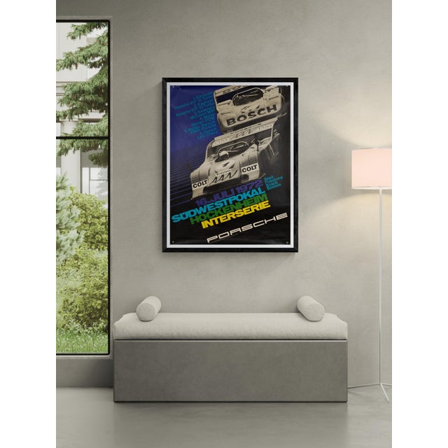 The Piece This original 1972 Porsche racing poster celebrates the Südwestpokal Hockenheim Interserie. Designed by the...
