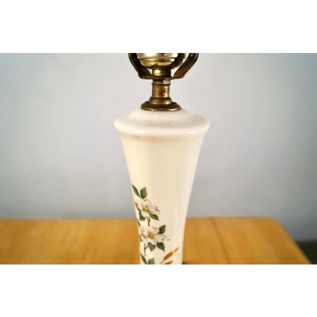 Vintage pair of Hollywood Regency Mid century table lamps for sale. They're made of ceramic with a beautiful glaze and...