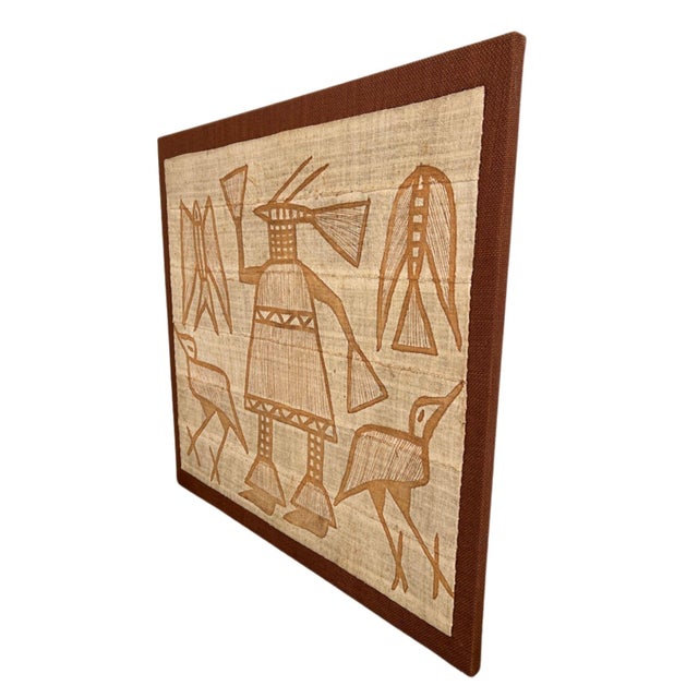 Often marketed alongside mudcloth textiles, this wall hanging is much more consistent with that tradition than with...