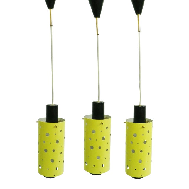 French Brass and Yellow Perforated Metal Pendant Lamps by Mathieu Mategot, 1950s, Set of 3 For Sale