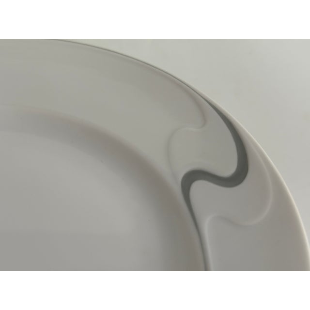 Item: Breakfast plate 20.5 cm Manufacturer: Rosenthal Series: Asimmetria Decoration: Slate Material: Porcelain Condition:...
