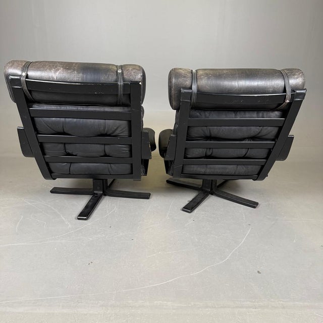 Mid-Century Modern Spinning Chairs in Black Leather, 1970s, Set of 2, in Good conditions. Designed 1970 to 1979