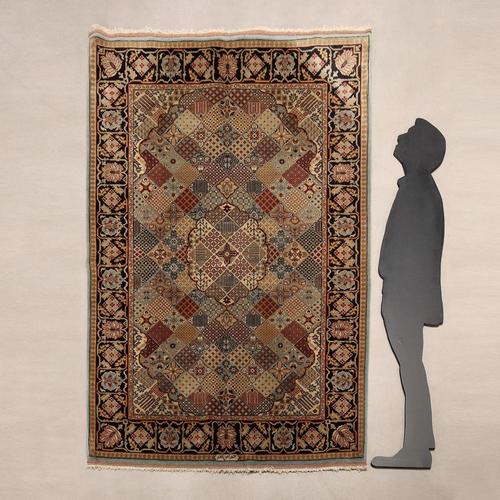 Tabriz rug, cotton and wool, large knot, hand-made. Good condition. This piece is attributed to the mentioned...