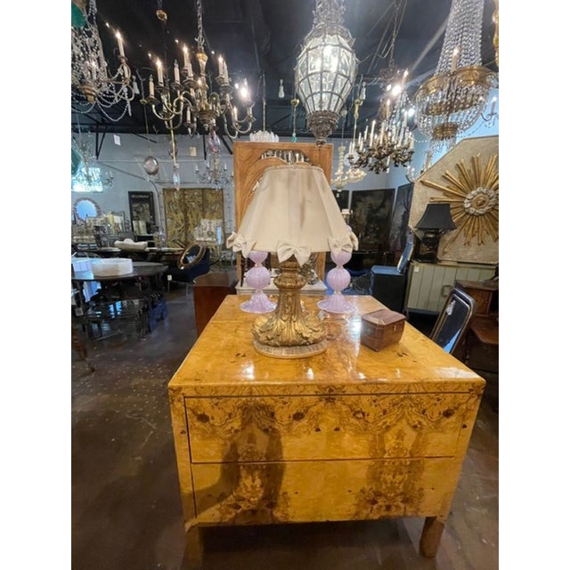This product is a collectible 19th century Italian giltwood element designed as a lamp. The intricate craftsmanship and...