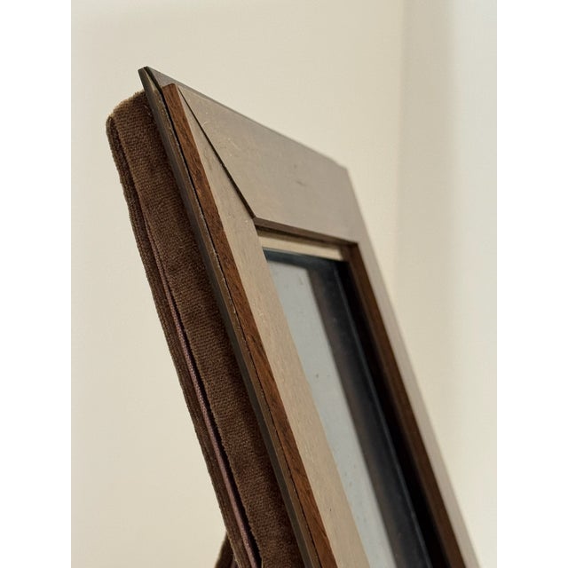 Bottega Veneta picture frame crafted in Italy, featuring a refined mix of warm brass trim and rich wood. Its understated...