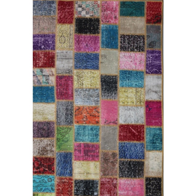A beautiful Vintage Patchwork Kilim . It's in very good condition, practically new. This Patchworks kilim is produced of...