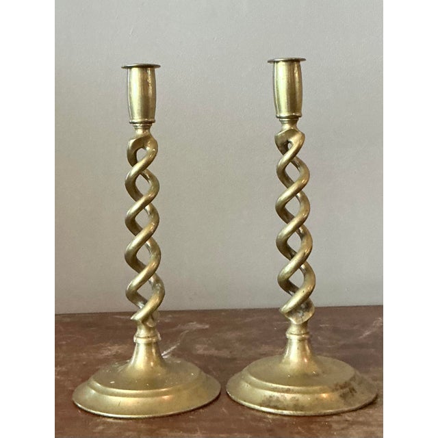 Elevate your interior with this exquisite pair of Vintage Regency Twisted Brass Candlesticks. These elegant pieces capture...