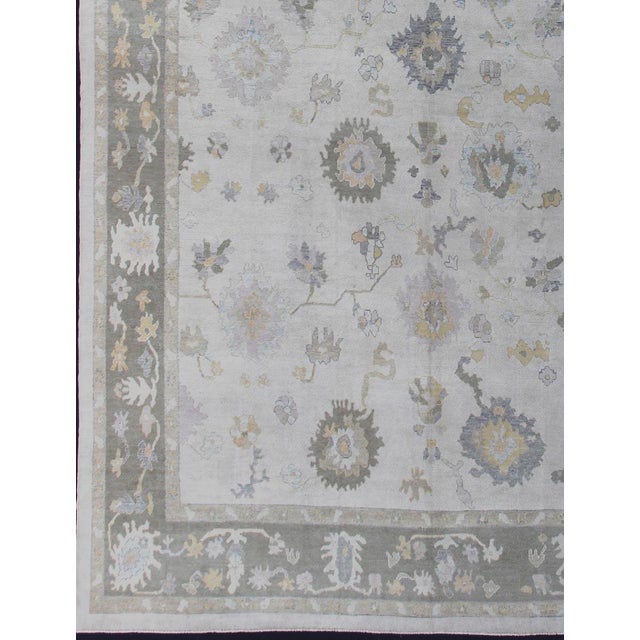 Measures: 14'2 x 21'6. Large Oushak Rug with Soft Gray, Sage Green, and Muted Pastel Accents. Keivan Woven Arts / rug...