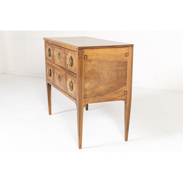 18th century french walnut commode an 18th century french walnut and inlaid commode. of rectangular form, and small size,...