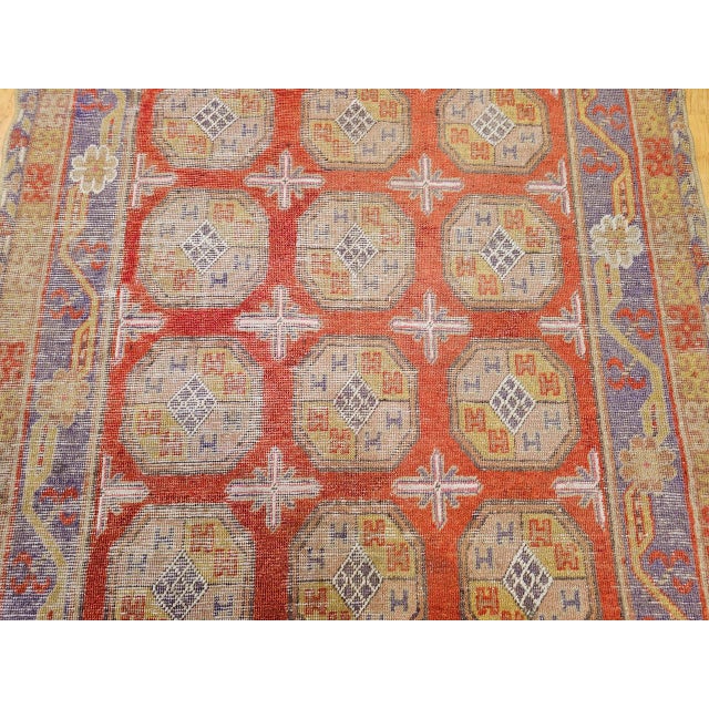 19th Century Khotan Rug in Allover Geometric Pattern in Red, Lavender, Ivory, Green For Sale - Image 10 of 16