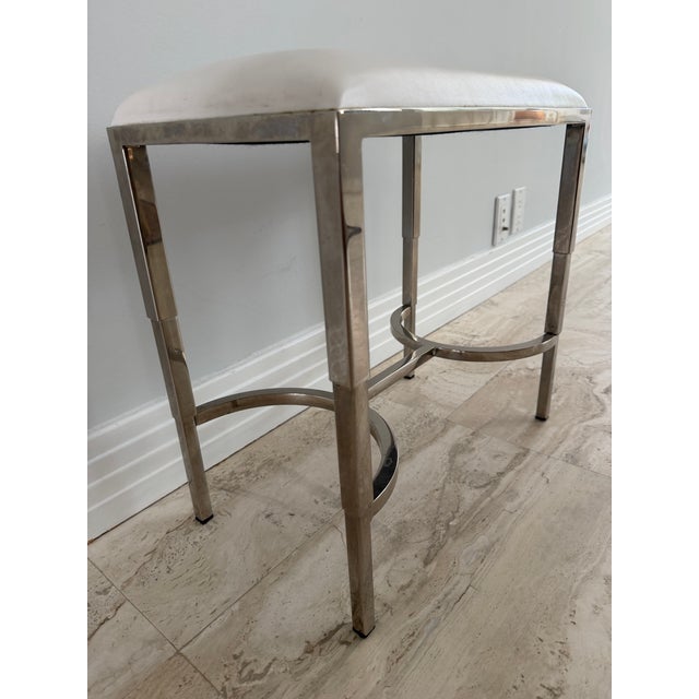 Easton metal/vinyl bench from Waterworks. Brass frame with Nickel finish and a white vinyl seat. Moisture resistant....