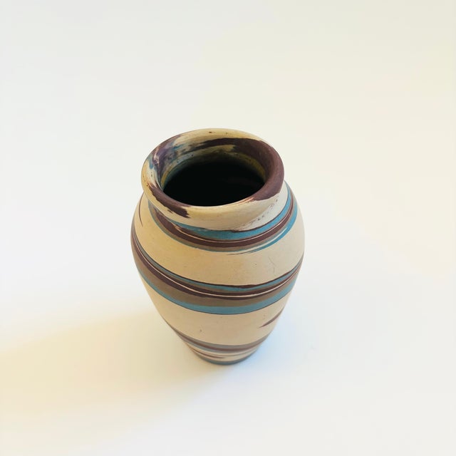 A vintage Niloak "Mission Swirl" pottery vase. These pieces were produced by the the Eagle Pottery Company of Benton,...