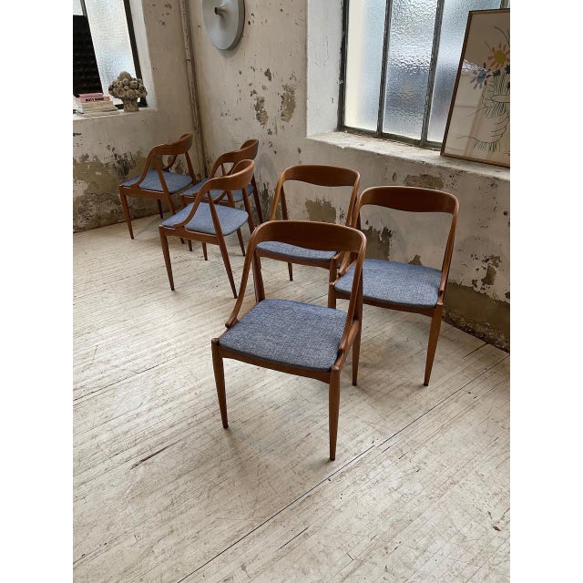 Superb set of 6 solid teak chairs by designer johannes andersen for udulm mobelfabrik, samcom edition. the stamp is...