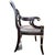 A refined custom-made neoclassical armchair produced in 2017 by Kindel Furniture, executed in a deep ebony finish with...