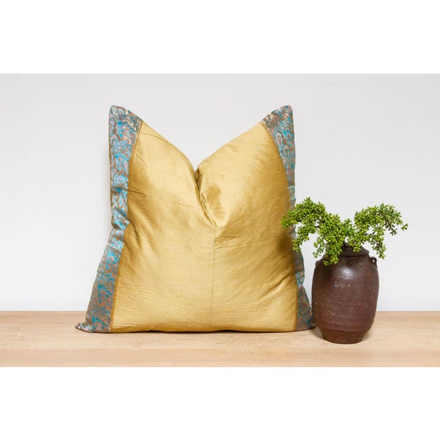 This brilliant silk euro pillow is a luxurious addition to any living room. Made out of silk with intricate borders of...