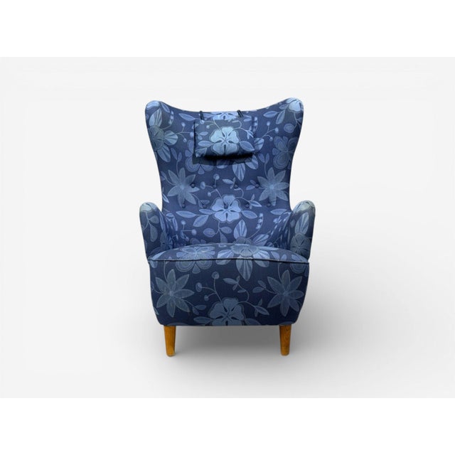 Danish Mid-Century Modern, Wingback Chair, Blue Fabric, Wood, Denmark, 1940s A freeform wingback lounge chair designed and...