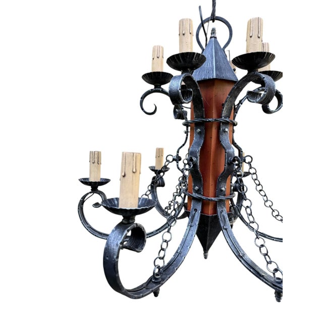 Offering a vintage castle-era chandelier inspired by historical periods known for their elaborate ironwork and grand...