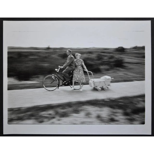 Family excursion, West Germany 1950s - 1960s (motion blur). Keywords: Germany; West Germany; postwar period; bicycle; man;...