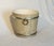 Mid-Century faux wood grain planter or bucket featuring gold-colored metal bands and attached ring handles. 13 inches wide...