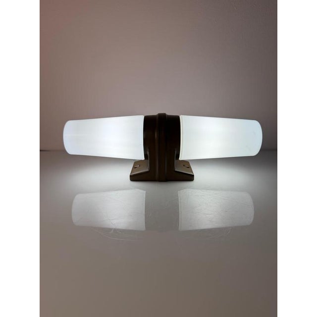 A true classic from sweden: the model 6060 wall lamp, designed by swedish prince and star designer sigvard bernadotte for...