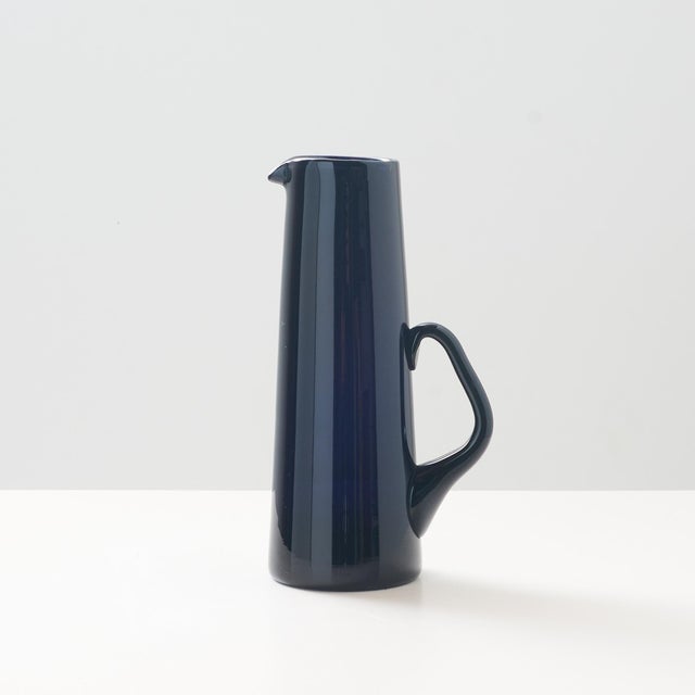 Sapphire Blue Water Pitcher by Per Lutken Denmark, c1970 An unsigned pitcher or vase of sapphire glass by Per Lutken for...