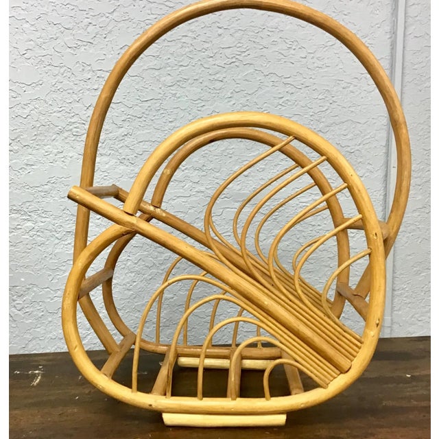 Amazing leaf design bamboo rattan magazine holder. In great vintage condition. Its curvy yet simple form makes it a...