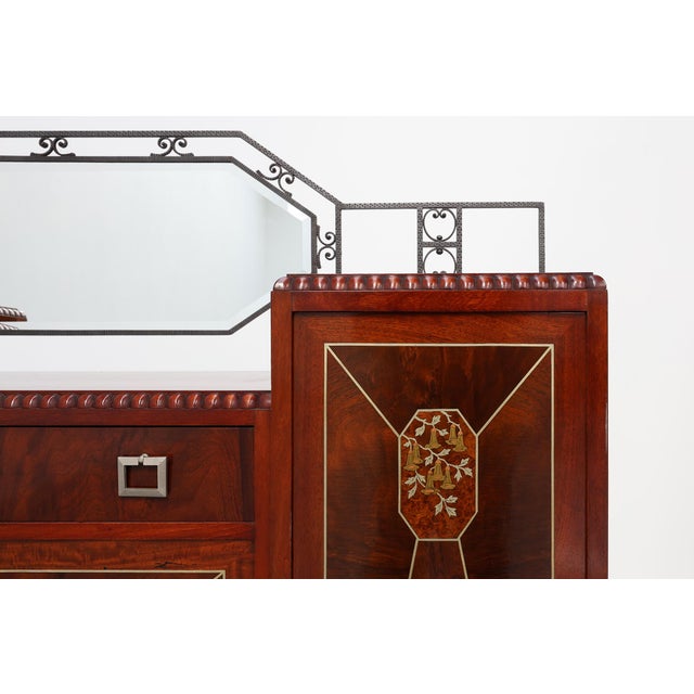 An exceptional Belgian Art Deco cabinet of remarkable decorative quality, dating from around 1925. Executed in the manner...