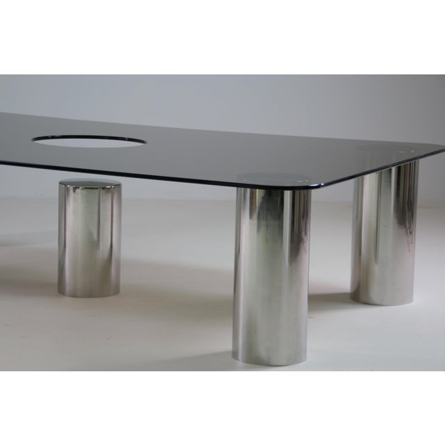This 1970s coffee table, designed in Italy, is a beautiful example of modern and bold design. Its chrome metal structure,...