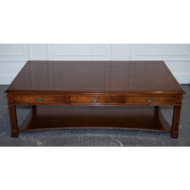 A fine large Georgian style burr walnut coffee table by Brights of Nettlebed London, beautifully crafted with classic...