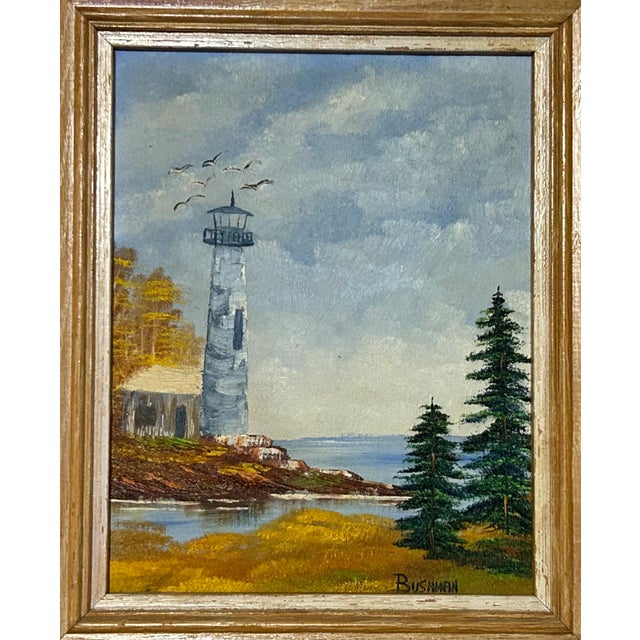 Up for sale is a Vintage Lighthouse Coastal Seascape Framed Oil Painting on Masonite Board Signed Bushman! It measures 14...