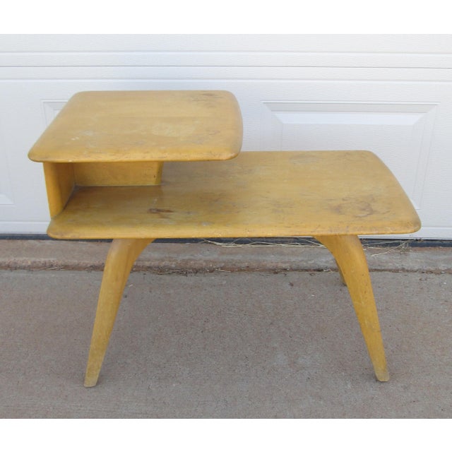 Vintage Heywood-Wakefield 2 tier step table. The table is believed to be model M308G but we did not find the model number....