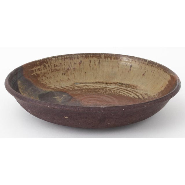 Toshiko Takaezu (American, 1922-2011) Polychrome Glazed Stoneware Charger, incised "TT" signature to underside. 2" H x 12"...